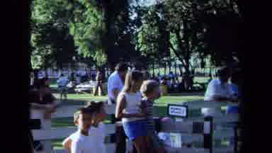 California USA (1971): Children Riding Animals At A Festival With Adult Handler