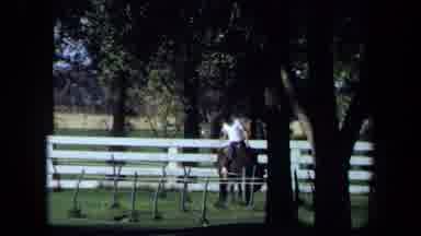 California USA (1971): Man On A Horse Riding Around On Nice Green Grass