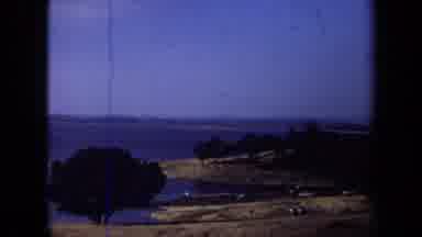 California USA (1971): People Snorkeling And Swimming In A Lake Surrounded By A