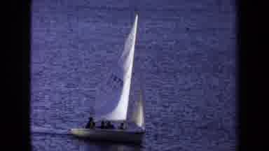 California USA (1971): A Single Sailboat Sails Across The Ocean