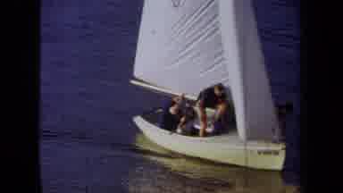 California USA (1971): A Group Of People Riding A Boat On The Lake And Then Coming
