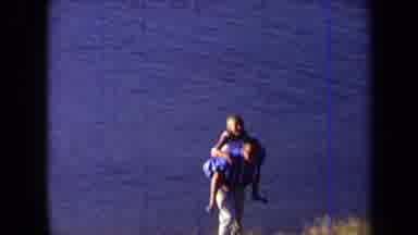 California USA (1971): Home Video Of Man Carrying A Child On His Back