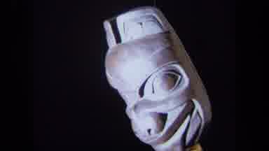 California USA (1971): A Parade Mask Spins As It Hangs Mysteriously From The Sky