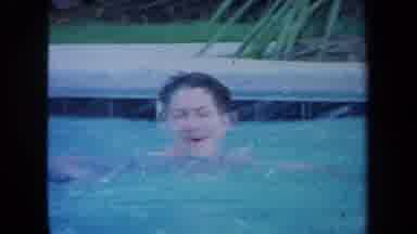 California USA (1971): Woman Swimming In Pool Before Zoom In To Words Squaw