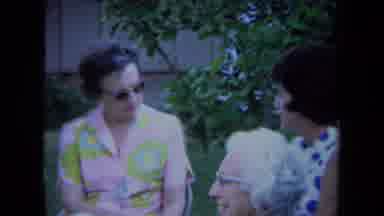 California USA (1971): Mature Ladies At A Gathering Talking Nazi Propaganda Slogan