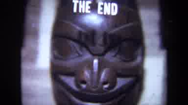 California USA (1971): The Last Scenes From A Jungle Movie Showing An Icon Mask