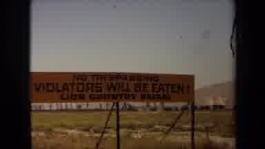 Laguna Hills California USA (1971): An Orange Sign Warning People That The Lion