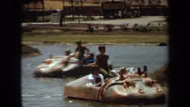 Laguna Hills California USA (1971): Six Children Ride Two Hippo Boats On A Lake