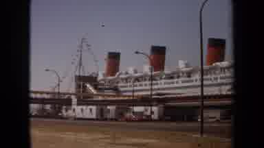 LAGUNA HILLS CALIFORNIA USA-1971: Ocean Liner Docked At Port With Red And Black Funnels