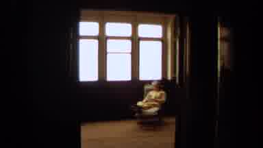 Long Beach California USA (1971): Old Woman Sleeping On A Chair During A Nice Day