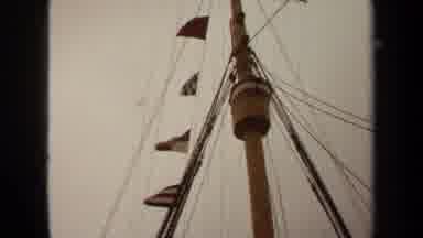 Long Beach California USA (1971): Ship Flags Near The Top Of The Mast Blowing In