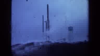 Maine USA (1971): A Grainy Dark Video Showing A Water Tower And Some Other Tower