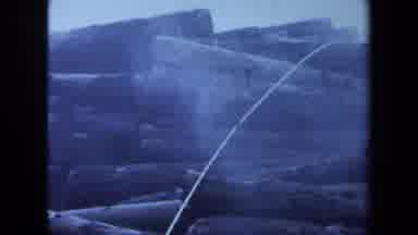 Maine USA (1971): Wood Smoke Mess Stacking Fire Rope Big Clutter Sky Landscape