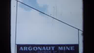 Maine USA (1971): Argonaut Mine Sign Cutting To Zoom Of A Set Of Old Buildings
