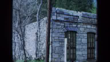 Maine USA (1971): Derelict Stone Facade Of An Old Building In A Green Country