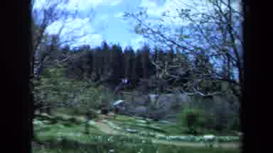 Maine USA (1971): Beautiful Spring Day With Clear Blue Skies And A Person Walking
