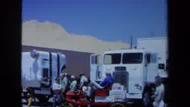 Maine USA (1971): Truck Drivers In Construction Zone Area During Daytime And Crane