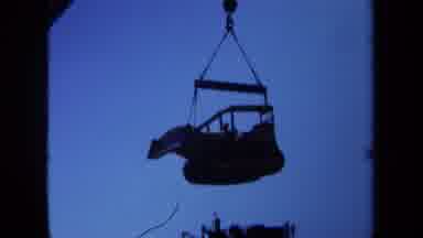 Maine USA (1971): Docked Ship Tied Load Bulldozer Machinery People Walking Windy