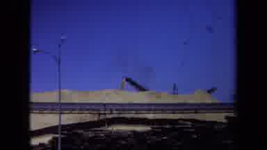 Maine USA (1971): A Group Of People Walking Under A Beautiful Arch Way Made Of