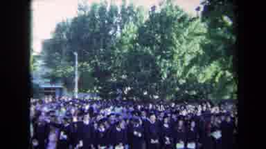 Sacramento California USA (1971): Academic Ceremony Outdoors On A Windy Day Two