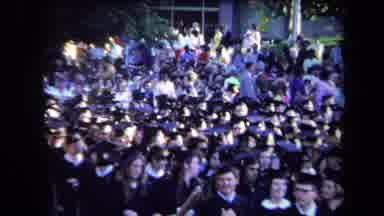 Sacramento California USA (1971): Busy Graduation Scene With Graduates Sat In