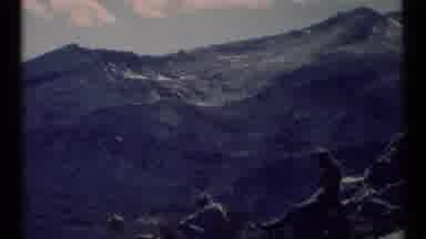 SCAPEGOAT WILDERNESS MONTANA USA .MP-1973: Mountains In View With People Sitting