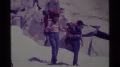 MINARET WILDERNESS CALIFORNIA USA .M-1975: Mother And Son Backpacking On Cliff