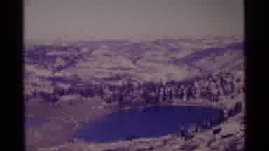 MINARET WILDERNESS CALIFORNIA USA .M-1975: Vintage Video Overlooking A Lake With