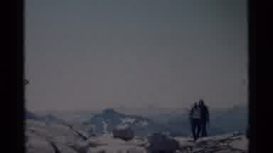 MINARET WILDERNESS CALIFORNIA USA .M-1975: Couple Hiking Through Mountainous