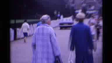 London England (1969): Ladies In Blue And Tweed Coats Walk Down Bath Side By Side