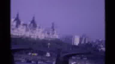 London England (1969): Cars Driving On Bridge Over Water While Boats Are In The