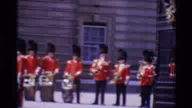 London England (1969): Queens Guards At Work With Glimpse Of Buildings And Statues