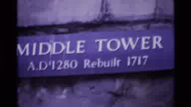 London England (1969): A Showcase Of The Middle Tower On A Sign And A Big Tower In