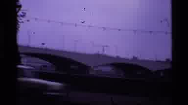 London England (1969): Picture Of A Car Passing Down The Street Near A Bridge