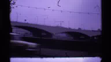 London England (1969): An Old Footage Of A Bridge Over A River Joining Two Lands