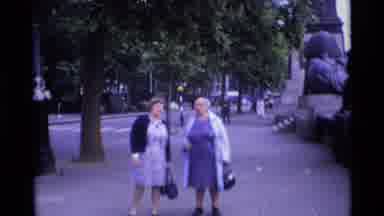 LONDON ENGLAND-1969: Two Women Walking and Conversing on a London Street