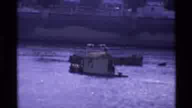 London England (1969): Ship Sailing In A Body Of River Near An Infamous Landmark