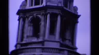 London England (1969): A View Of A Statue Up High And A Giant Building Made Of