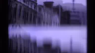 London England (1969): People Walking And Cars And Buses Zooming Through London