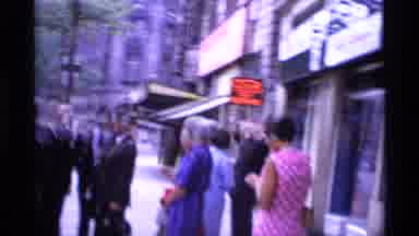 London England (1969): People Leaving The Waldorf Hotel Waiting For A Taxi Cab