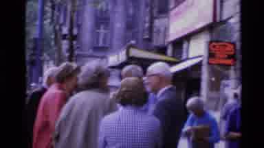 LONDON ENGLAND-1969: Tourists Gathering On Downtown Street