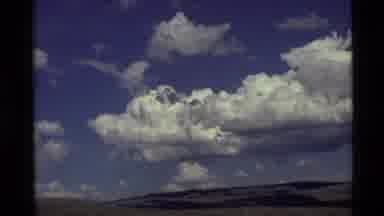 Holland Lake Montana USA (1972): Two Shots Of White Clouds Floating In A Very Blue