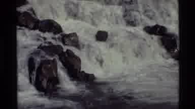 Holland Lake Montana USA (1972): Body Of Water Trickles Down Rocks Creating Rapid