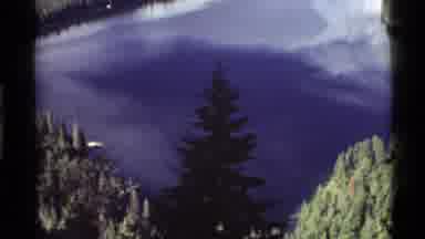 Holland Lake Montana USA (1972): Aerial View Of The Reflection Of A Tree In A