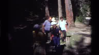 Holland Lake Montana USA (1972): A Group Of Guys Walking One By One Up A Hill With