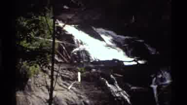 Holland Lake Montana USA (1972): Waterfall Cascade On A Mountain Top With Rocks