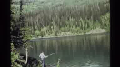 Holland Lake Montana USA (1972): Man Fishing In The Mountain Full Of Bodies Of