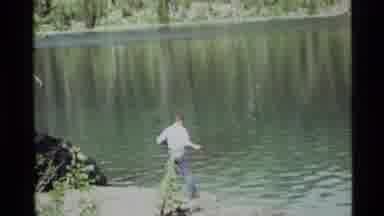 Holland Lake Montana USA (1972): A Man Near Lake He Fishing The Fish