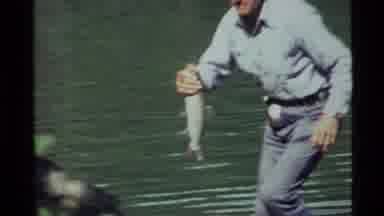 Holland Lake Montana USA (1972): Vintage Video Of Man Retrieving Fish He Just