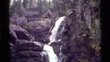 Holland Lake Montana USA (1972): Water Falling Over A Cliff Creating A Multilayer